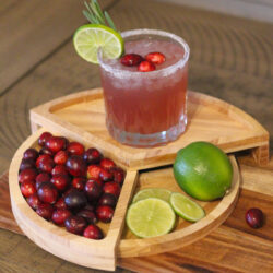 This Cranberry Margarita recipe is a festive Holiday cocktail filled with cranberry juice, lime juice, and of course, tequila!