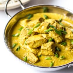 Creamy, spiced Chicken Korma is the stuff dreams are made of. Loosen up those pants and make this delectable Indian dish at home!
